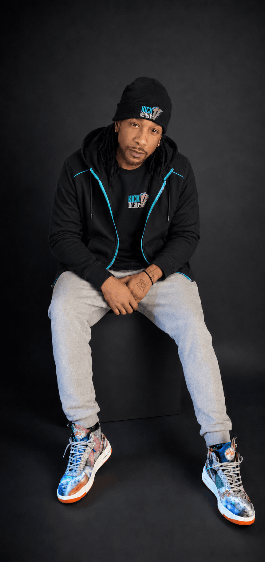 Ace Thriva in Kick Habitz gear wearing his own custom sneakers
